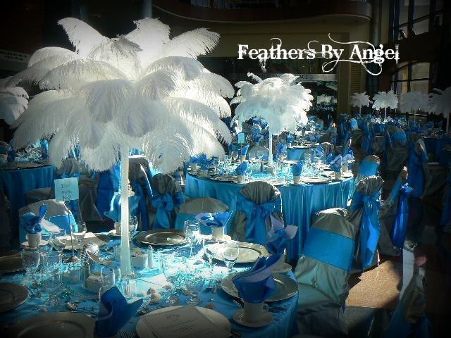 wedding centerpieces with feathers and flowers